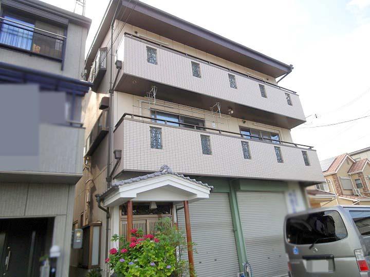 Local appearance photo. The first floor is also available as a large garage and a warehouse store