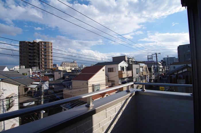 View photos from the dwelling unit. View from the third floor balcony! 