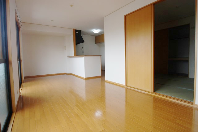 Living and room. The window is large lighting is also good