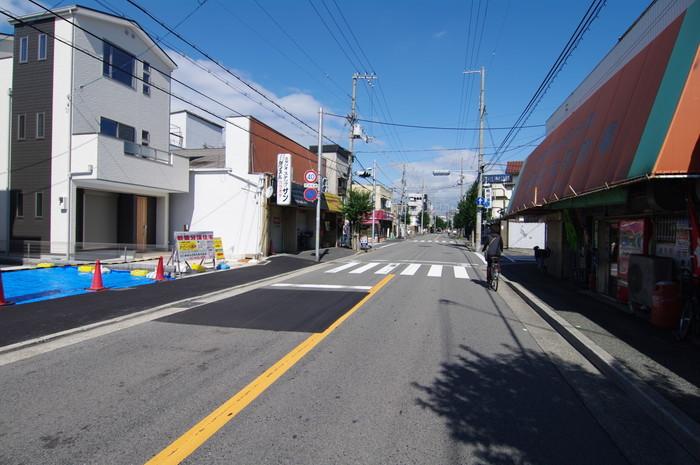 Local photos, including front road. Front road is wide and 12m