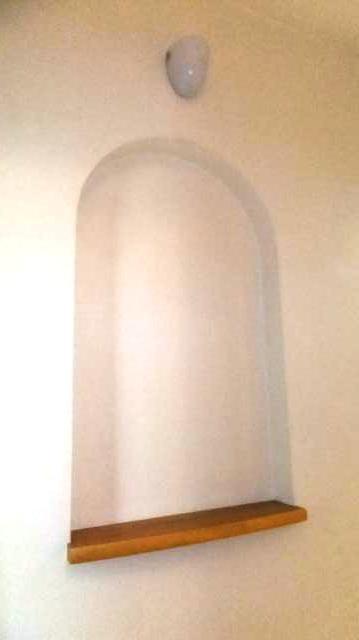 Other introspection. There is a niche on the second floor staircase landing