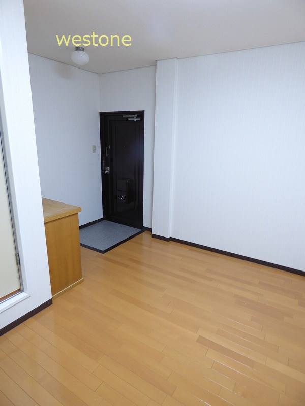 Other room space. Shot to the front door.