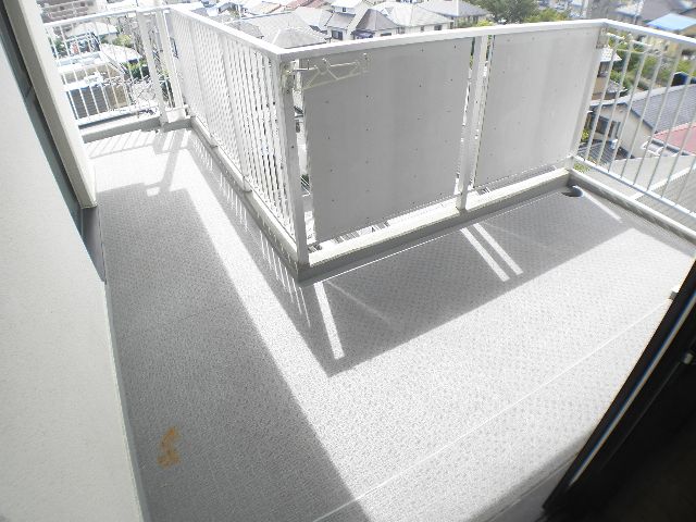 Balcony. Spacious balcony of sunny L-shaped