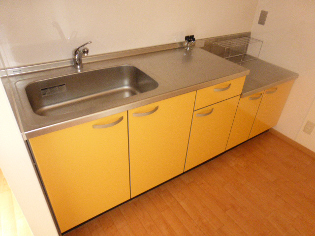 Kitchen. Spacious living room can be used comfortably