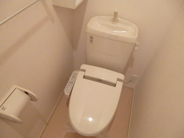 Toilet. bus Also it has a bathroom dryer