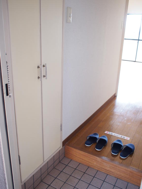 Entrance. With spacious cupboard