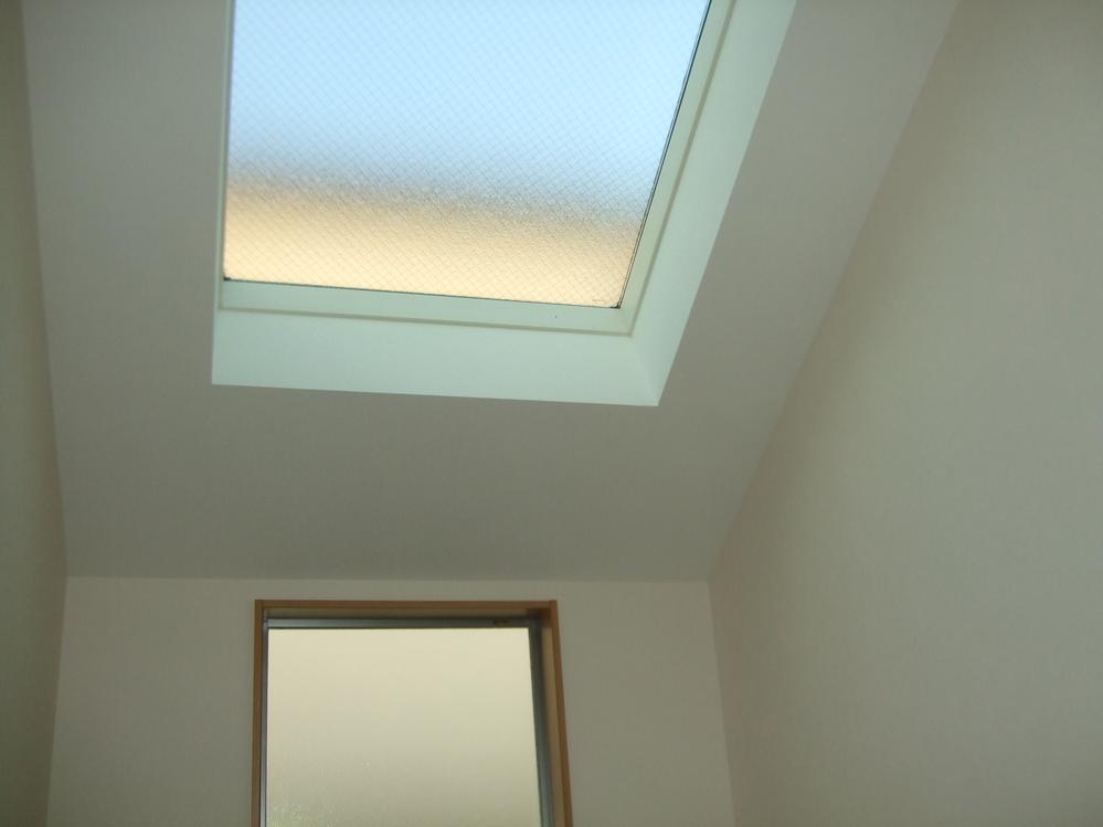 Living. There is a top light, Living is very bright house.