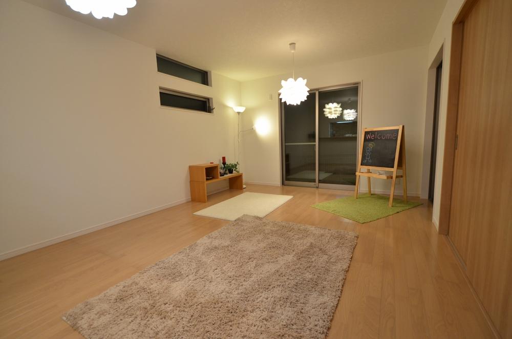 Living. Living as seen from the kitchen side. Day is good.