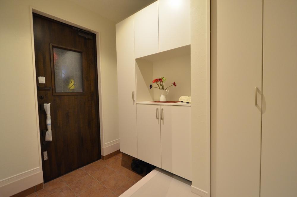 Entrance. There are housed rich shoes BOX and storeroom at the door.