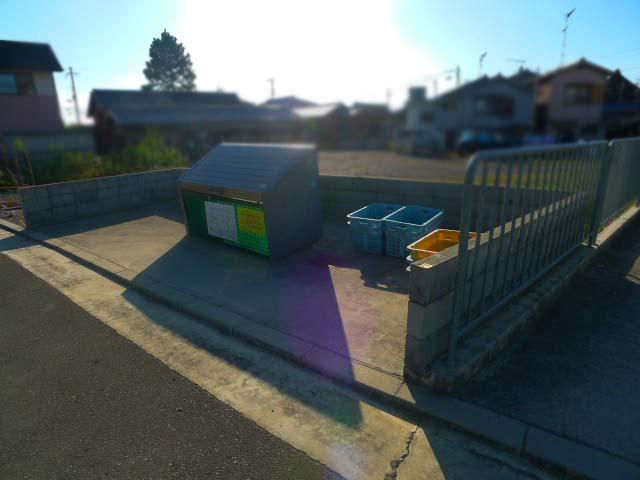 Local photos, including front road. Local (10 May 2013) Shooting Local is a garbage station