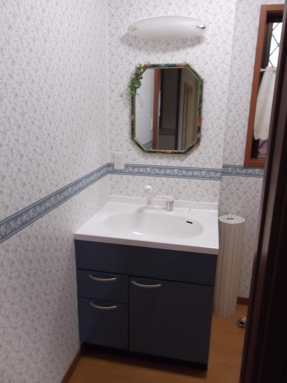 Wash basin, toilet. Bathroom vanity