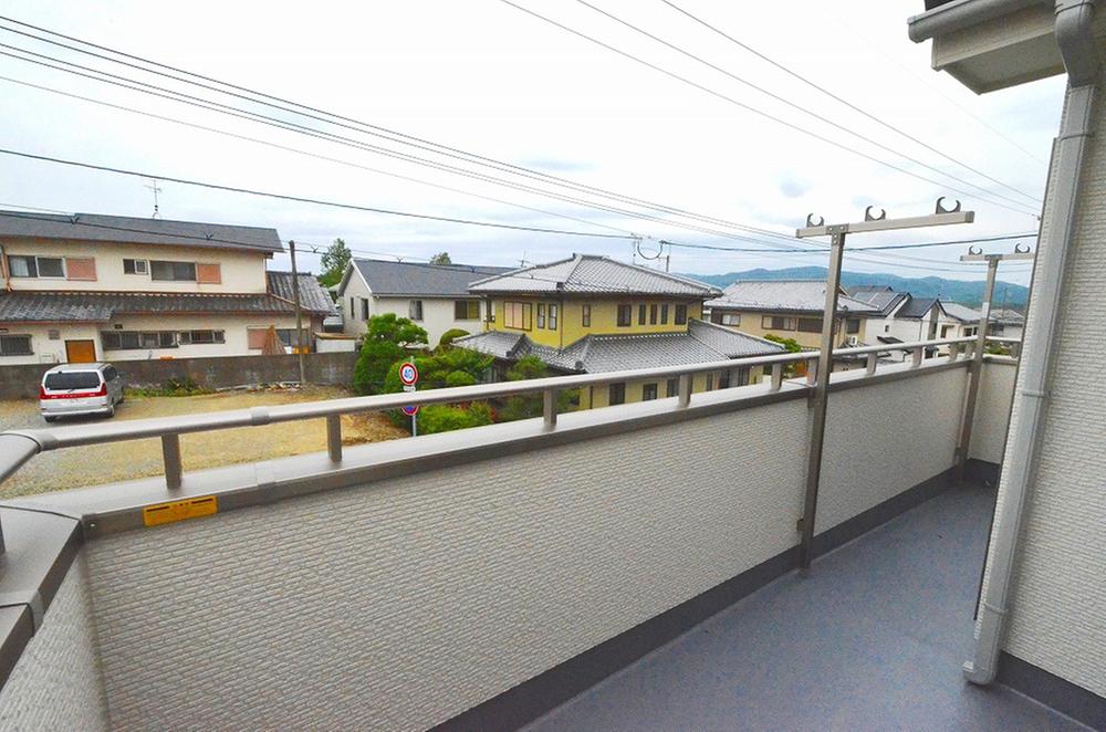 Balcony. Also dry well laundry Since it has 1 Building balcony photo spacious with
