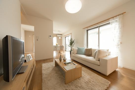 Living. It is a bright living room and spacious.