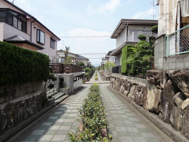 Local photos, including front road. East passage of the property (from the south)