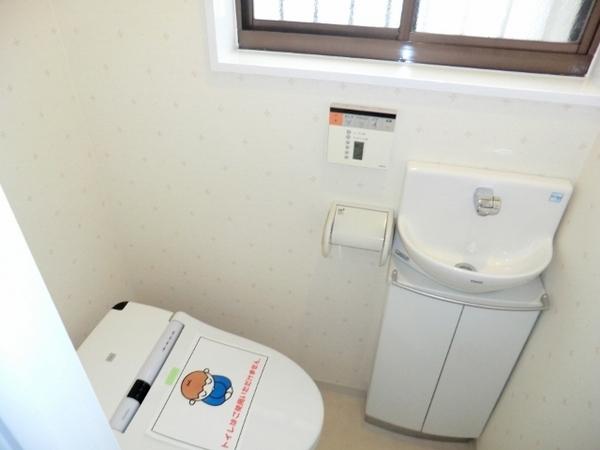 Toilet. Toilet is also a pre-renovation