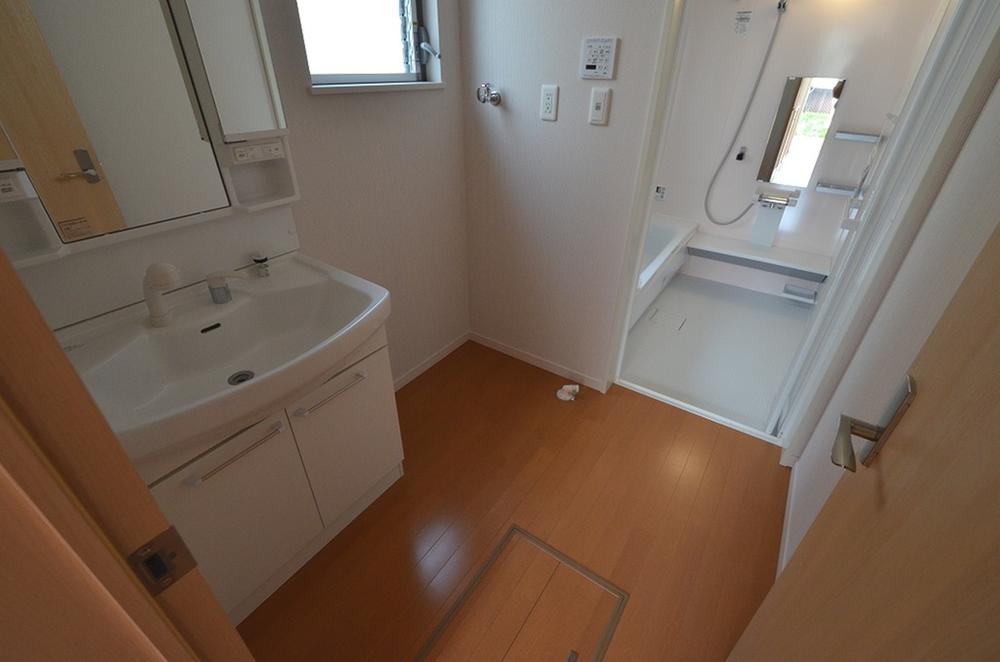 Wash basin, toilet. Example of construction photos of washroom