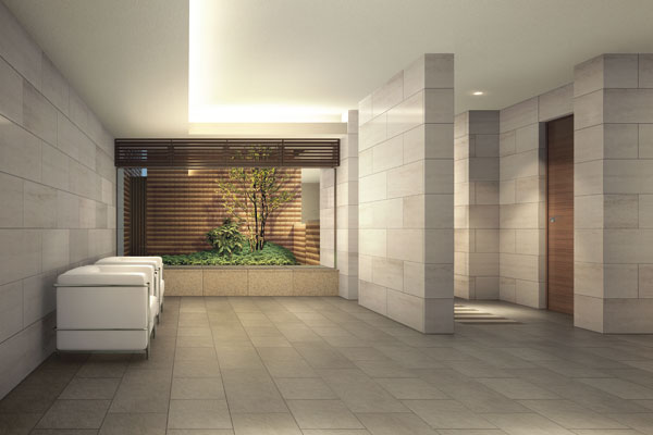 Buildings and facilities. Open entrance hall overlooking the courtyard, Sense of quality has been directed by the indirect lighting and bright lime stone (Entrance Hall Rendering)