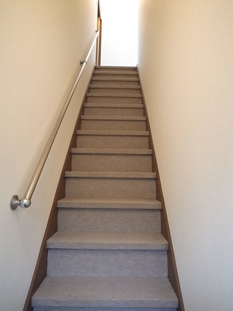 Entrance. To the second floor by the stairs