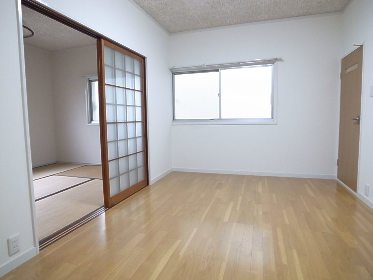 Living and room. Flooring is beautiful