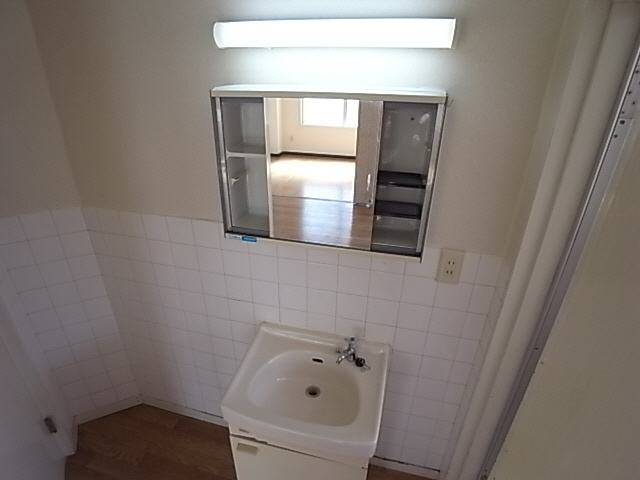 Washroom. Reference image (It is a photograph of the other in Room)