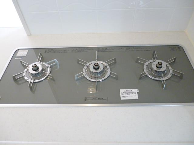 Kitchen. Triple wide gas stove