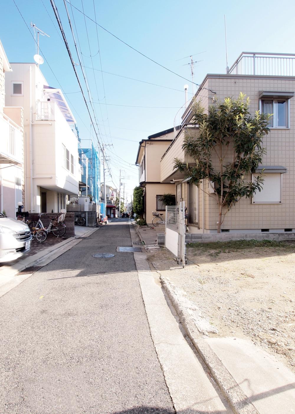 Local photos, including front road. Local neighborhood is a quiet residential area. 