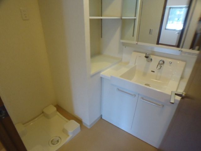 Washroom. Clean water around with cleanliness.