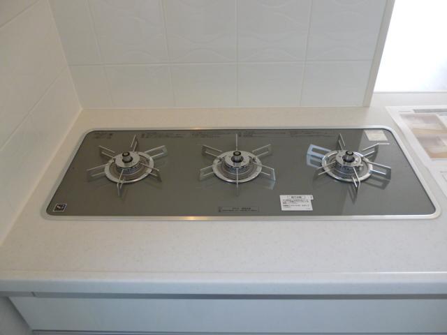 Kitchen. Triple wide gas stove