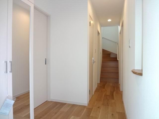 Entrance. The first floor entrance hall. Shoe box with mirror.