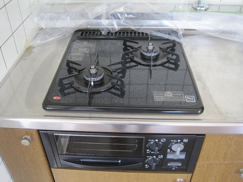 Toilet. Two-burner built-in stove