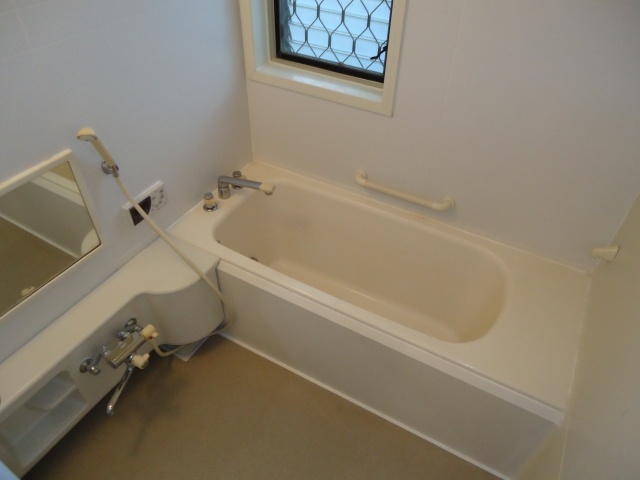 Bath. There is a window in the bathroom