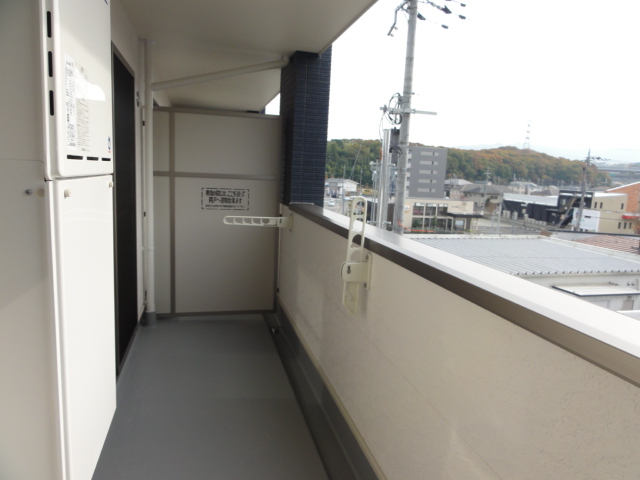 Living and room. Easy even your laundry in a wide balcony