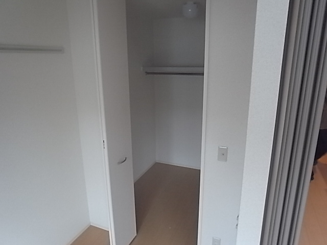 Living and room. Walk-in closet with a Western-style