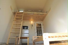 Living and room. High open ceiling