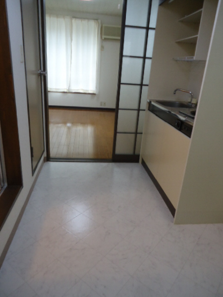 Other room space. Kitchen space