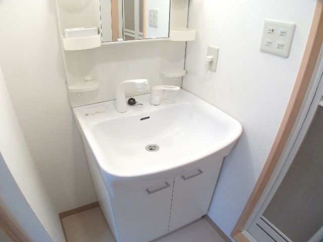 Washroom. Independent wash basin in this your rent! There is also a dressing room space.