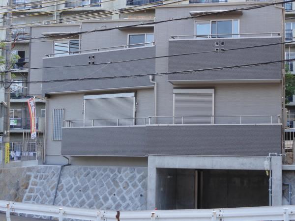 Local appearance photo. Whole than the east side (the basement garage front)