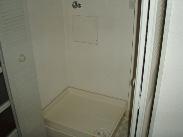 Other Equipment. Washing machine in the room