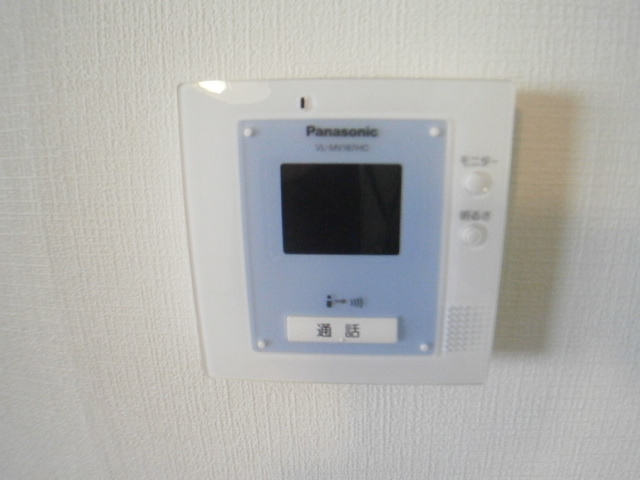 Security. TV monitor phone visitors can be seen