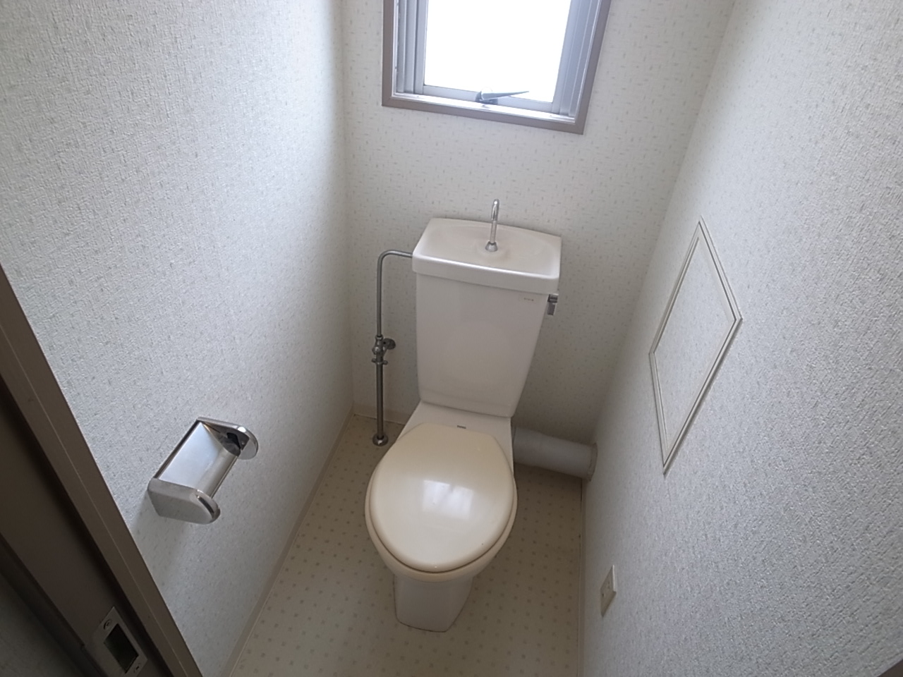 Toilet. This toilet has a window!
