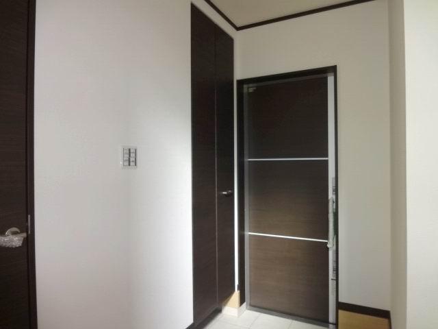 Entrance. The first floor entrance hall. Shoes is with a cloak.