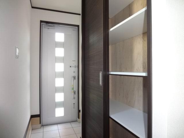 Entrance. The first floor entrance hall. Shoes is with a cloak. 