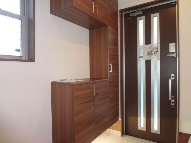 Entrance. The first floor entrance hall. Shoes is with a box.