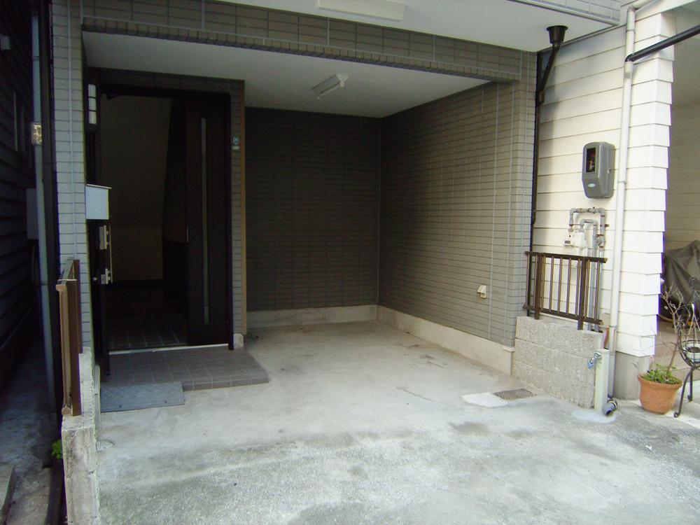 Parking lot. There are also room for parking spaces