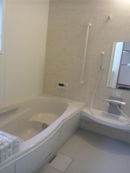 Bathroom. It is the unit bus of pastel design.