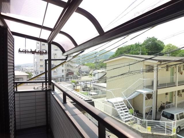 Balcony. Second floor balcony. It is with a roof.