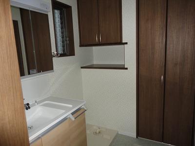 Wash basin, toilet. Storage enhancement Shelf installation