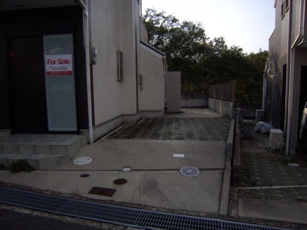 Parking lot. Front road is also widely, It boasts of parking easy