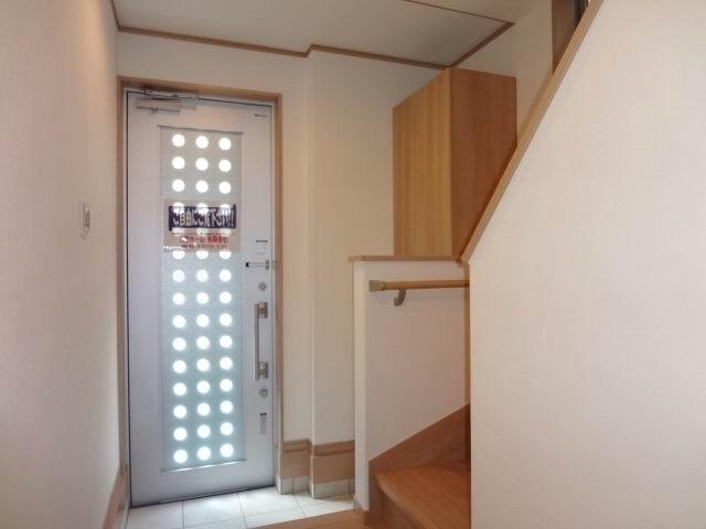 Entrance. The first floor entrance hall. Shoes is with a box.