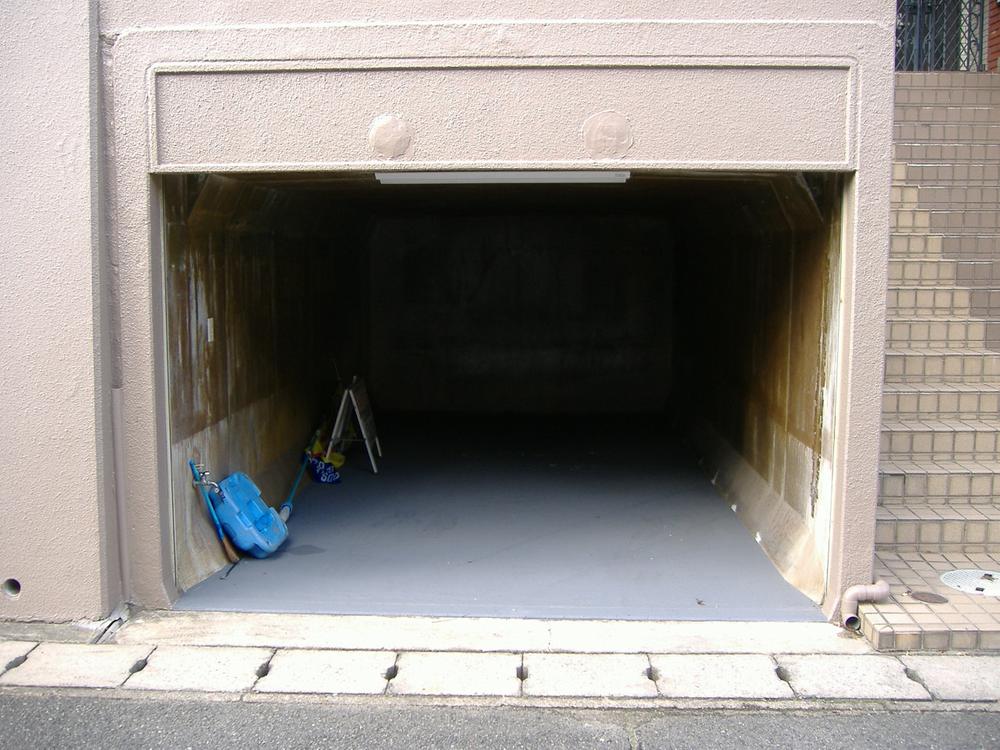 Parking lot. Excavation with garage